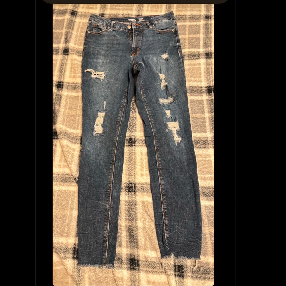 Distressed Blue Denim Jeans